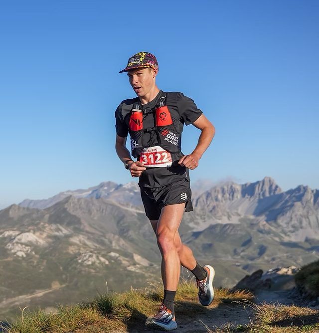 Brennan Townshend, ultra trail and mountain running coach, racing in the Alps