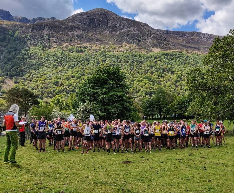 Runners gathered for the start of a fell race beneath a Lake District fell