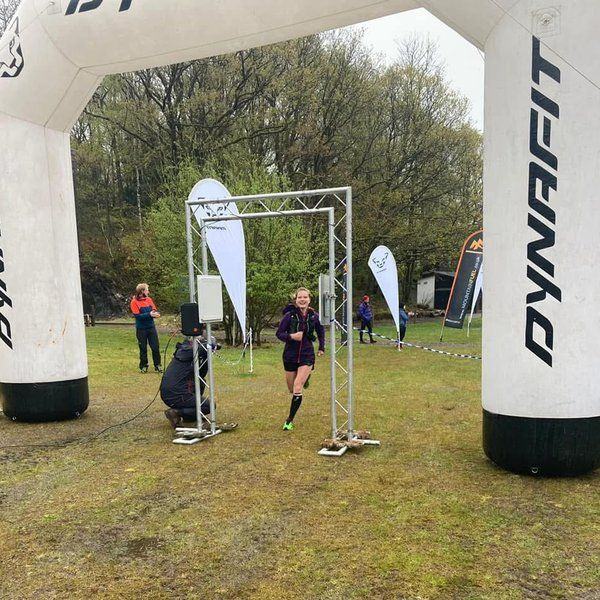Townshend Performance athlete finishing The Lap in the rain
