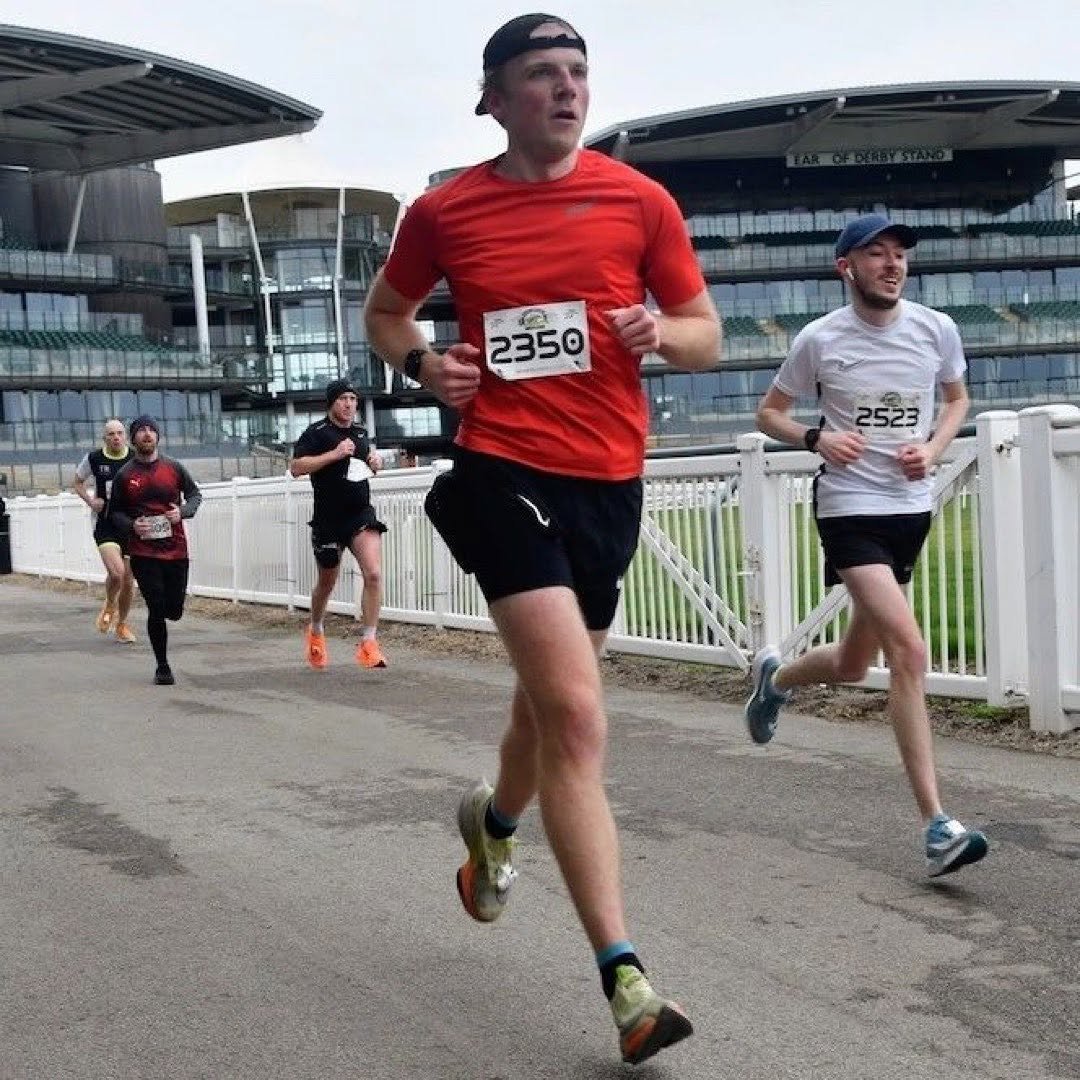 Chris racing the Aintree Half Marathon on the way to a 1:27:53 personal best