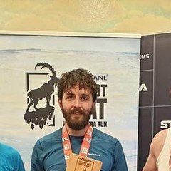 Hamish, coached by Brennan Townshend, with his medal at the Montane Cheviot Goat