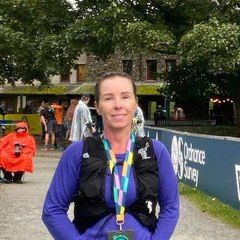 Hayley, coached by Kat Townshend, with her medal at the 13 Valleys Ultra finish