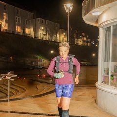 Tracy, coached by Kat Townshend, running her first 50K ultra at night
